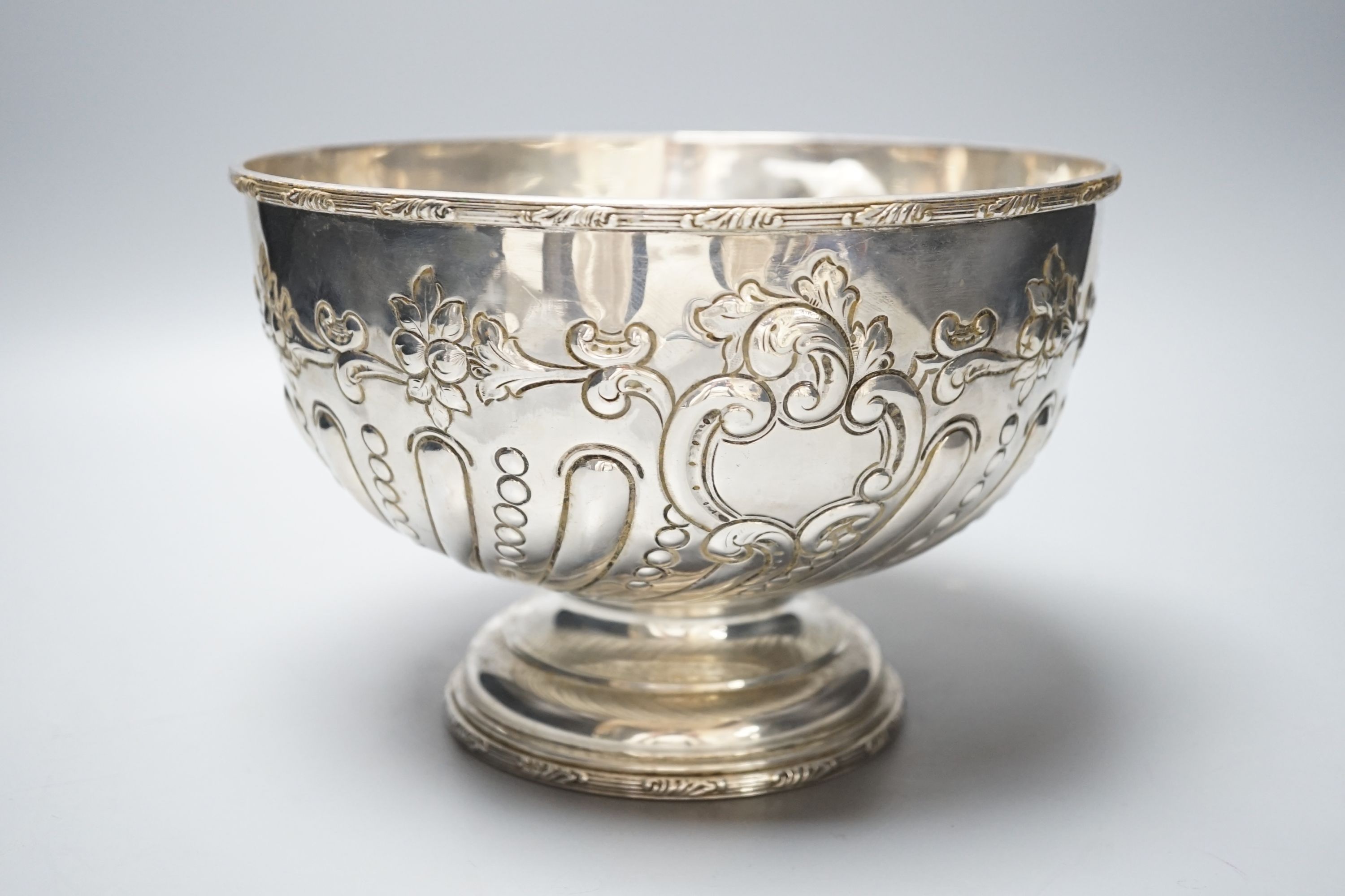 A George V embossed silver rose bowl, with later engraved inscription, Daniel & Arter, Birmingham, 1911, 22.5cm, 25oz.